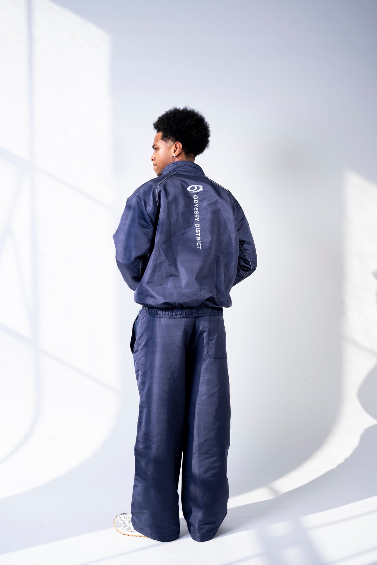 Track Set on model, 6'2" in size L, wearing District Navy